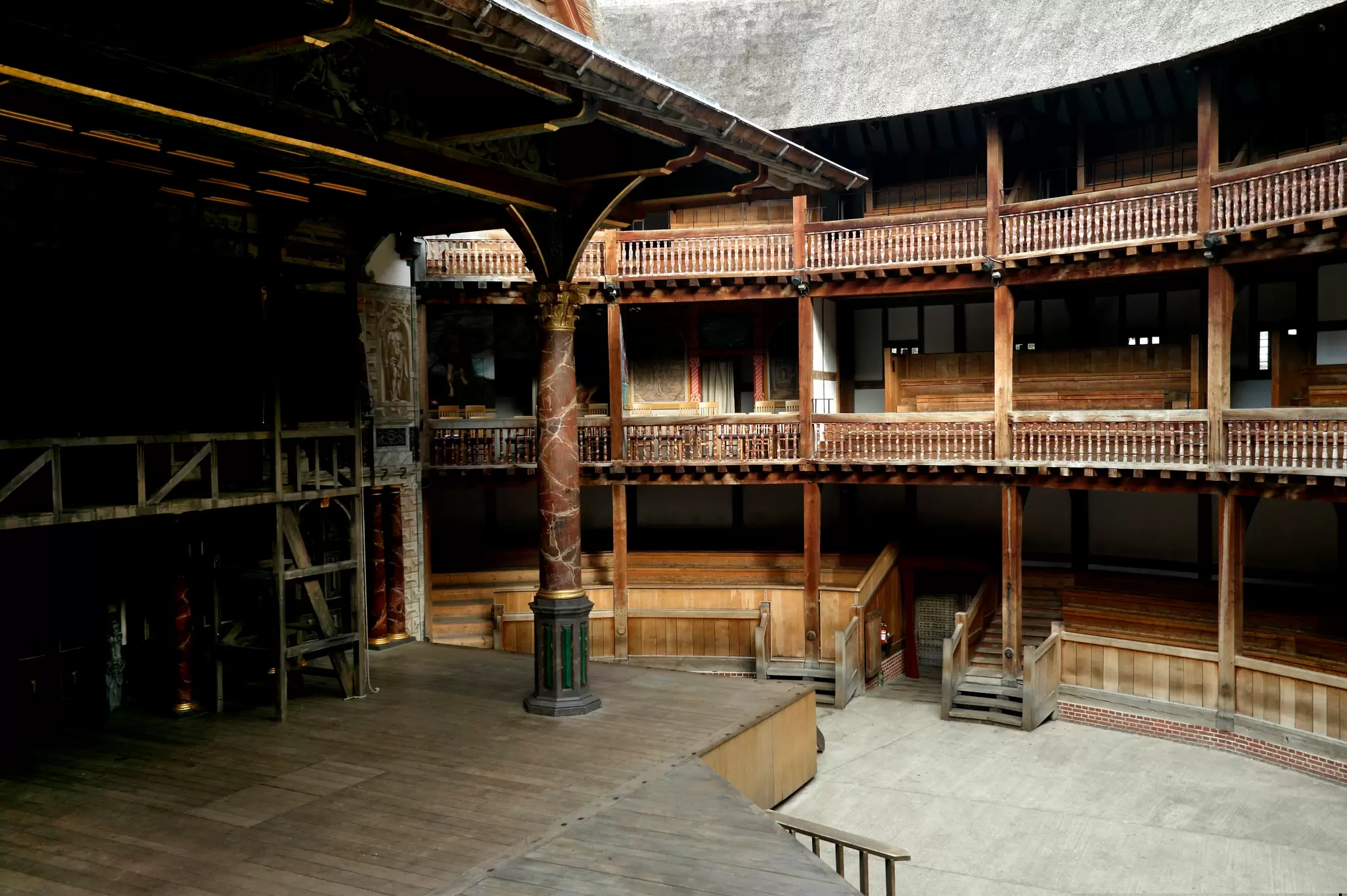 View of the stage and stalls at Shakespeare's Globe in London, UK.