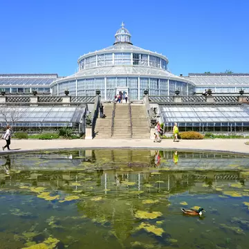 View of the historic glass greenhouses at the University of Copenhagen Botanical Garden (Botanisk have) in Copenhagen, Denmark.    