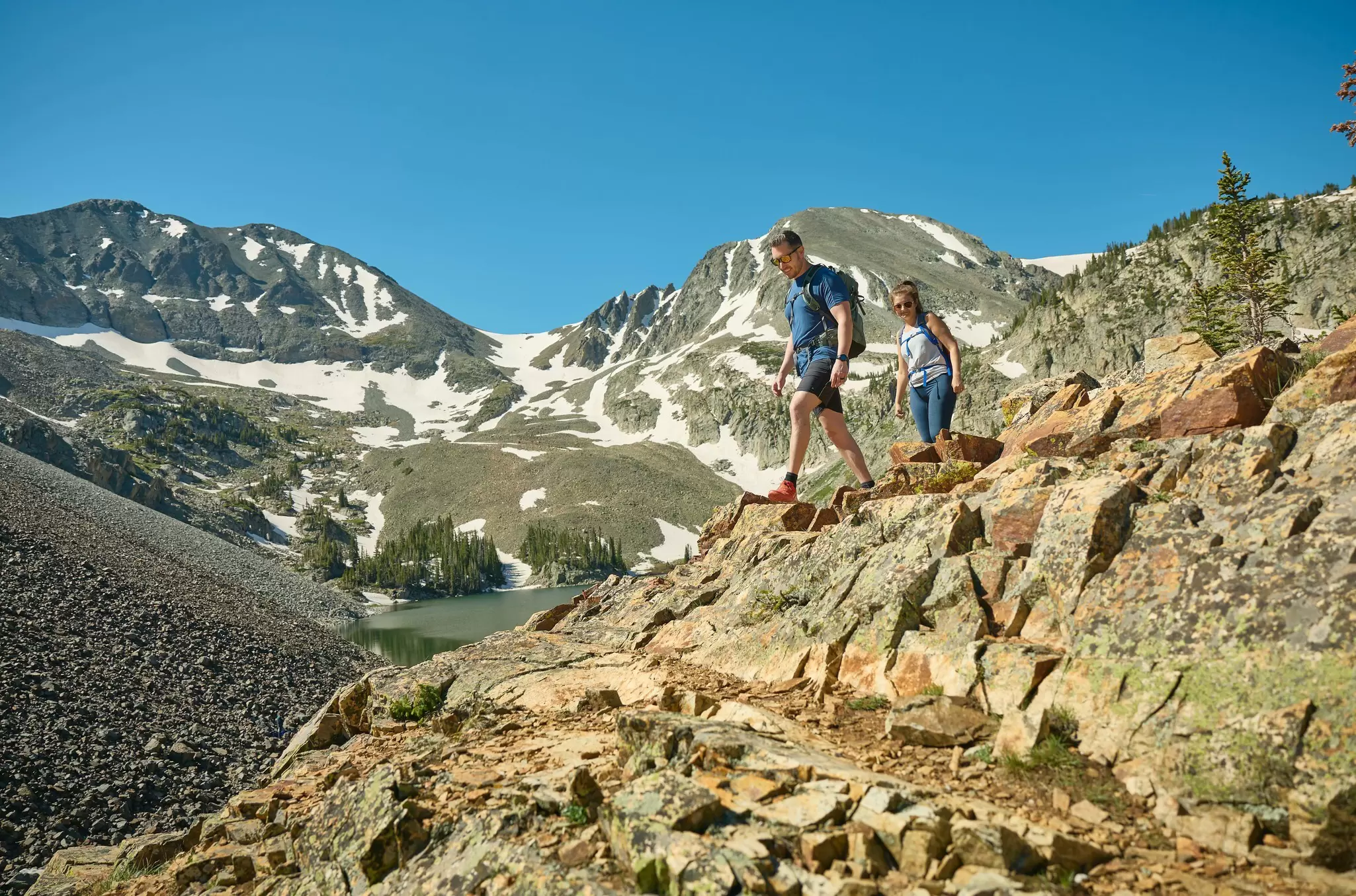 People hiking through the mountains in Colorado, USA.