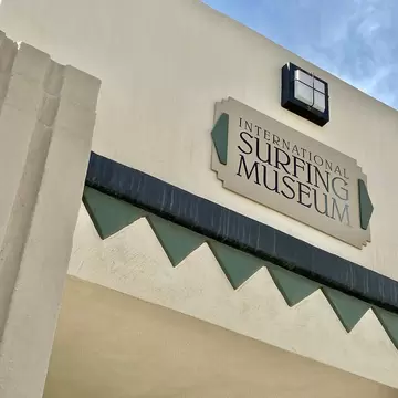 Huntington Beach, CA / USA - October 16, 2019:  Exterior of the International surfing museum in Huntington Beach, California, USA , License Type: media, Download Time: 2026-08-13T14:07:51.000Z, User: LP_NZhan, Editorial: true, purchase_order: 65050 - Digital Destinations and Articles, job: App Content, client: Lonely Planet App, other: Nadine Zhan