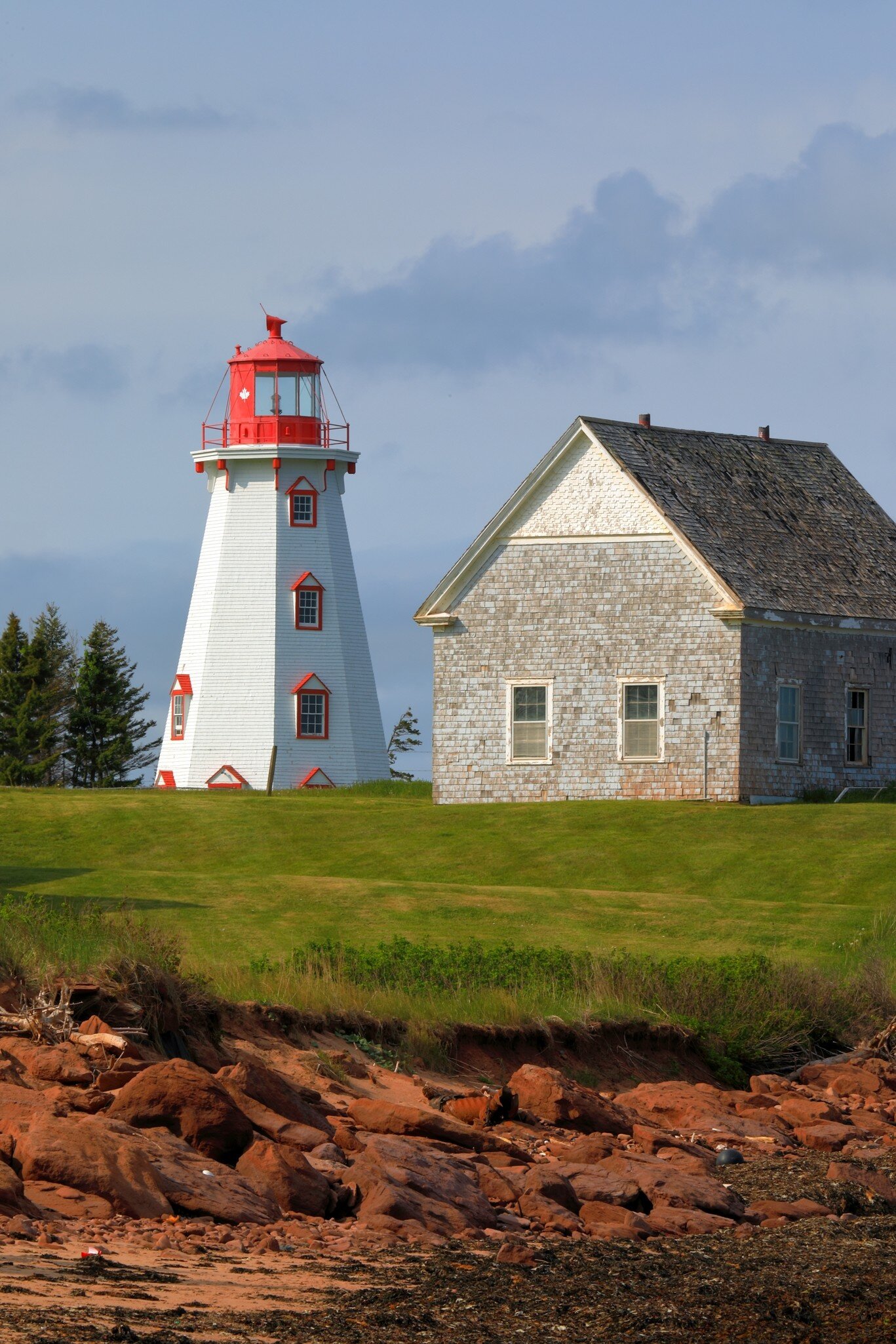 View of Panmure Head Lighthouse on a sunny day in Prince Edward Island, Canada.