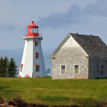 View of Panmure Head Lighthouse on a sunny day in Prince Edward Island, Canada.