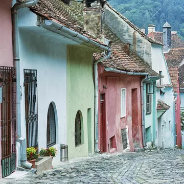 Cobblestone street in Sighisoara, Romania.