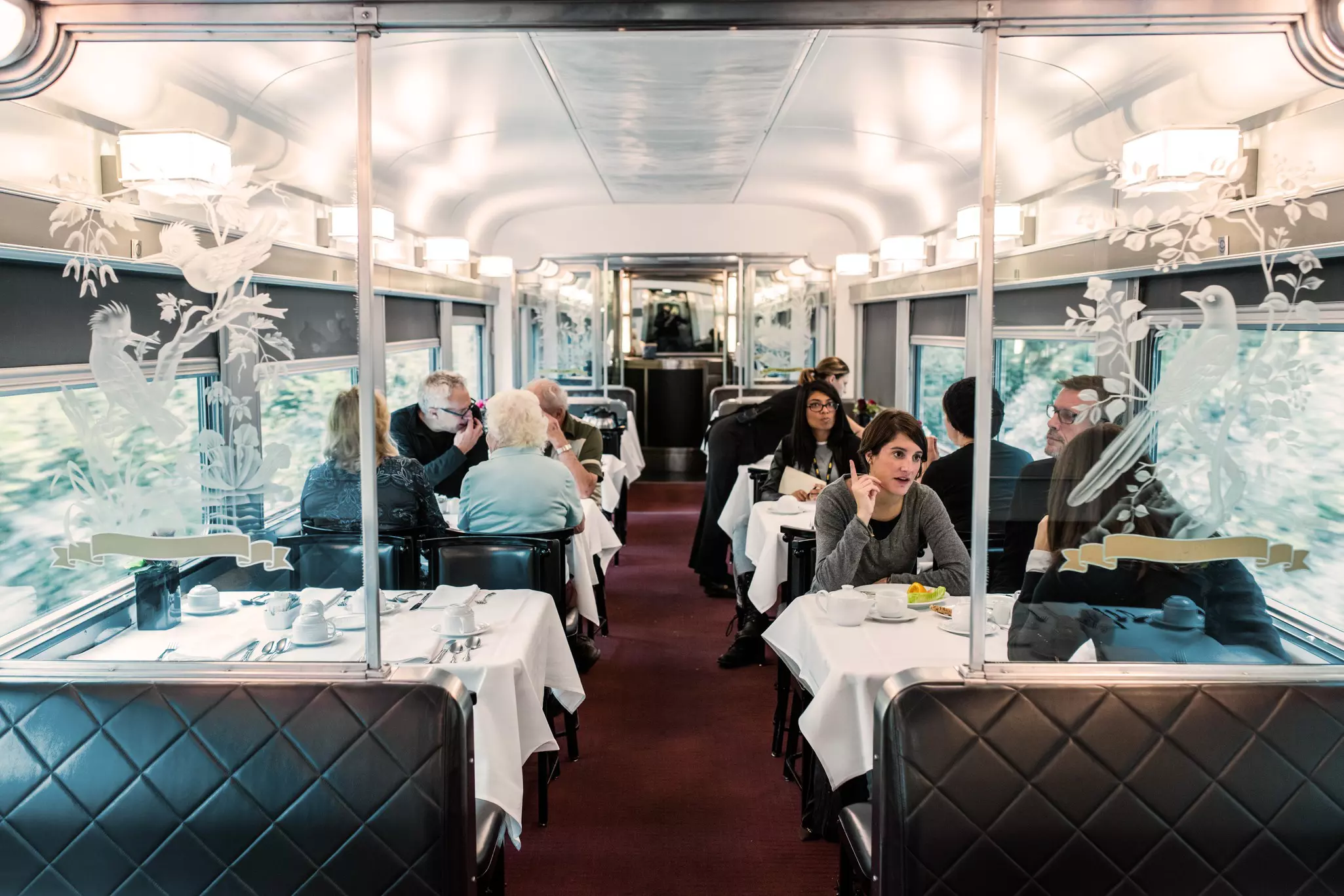 The plush dining car on board The Canadian © Via Rail