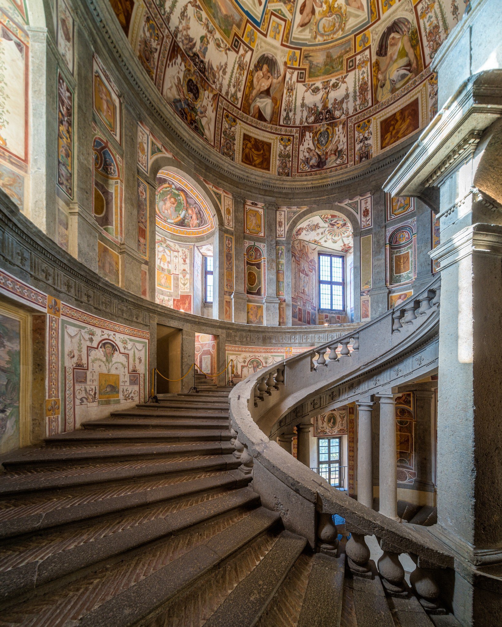 Marvelous frescoed staircase in Farnese Palace in Caprarola, Province of Viterbo, Lazio, Italy.
