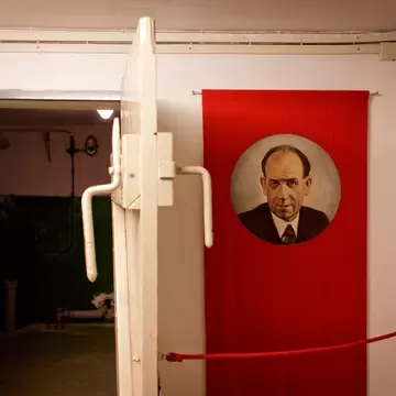 A shelter door and a portrait of Czechoslovakian President Antonin Zapotocky are displayed as part of an exhibition at the Cold War-Era nuclear shelter inside the Hotel Jalta on Wenceslas square in Prague, Czech Republic. 