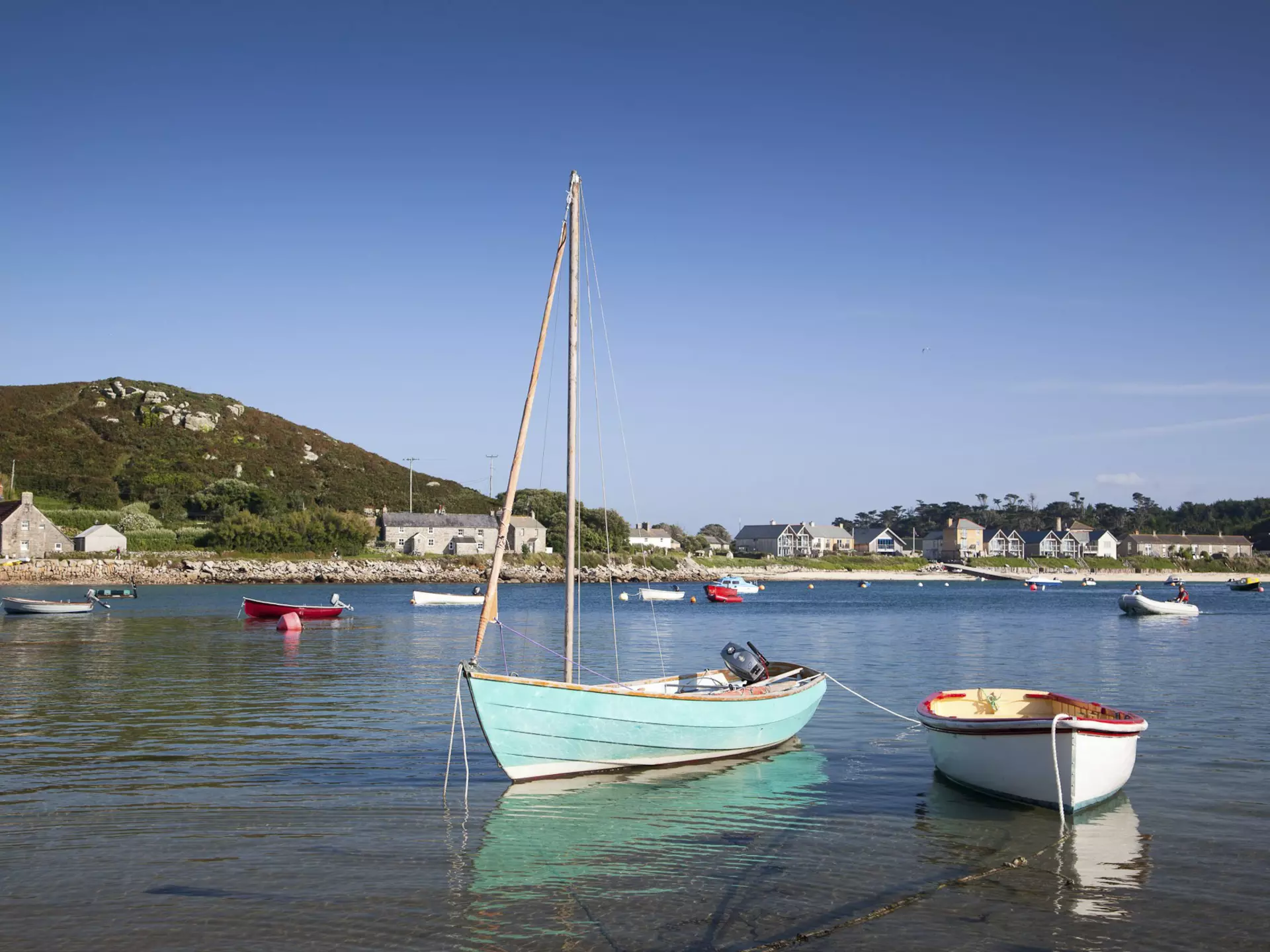 Boats anchored in New Grimsby harbour in Scilly