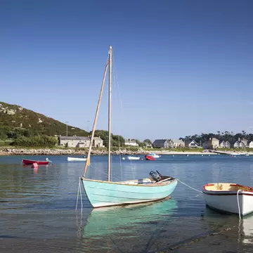 Boats anchored in New Grimsby harbour in Scilly