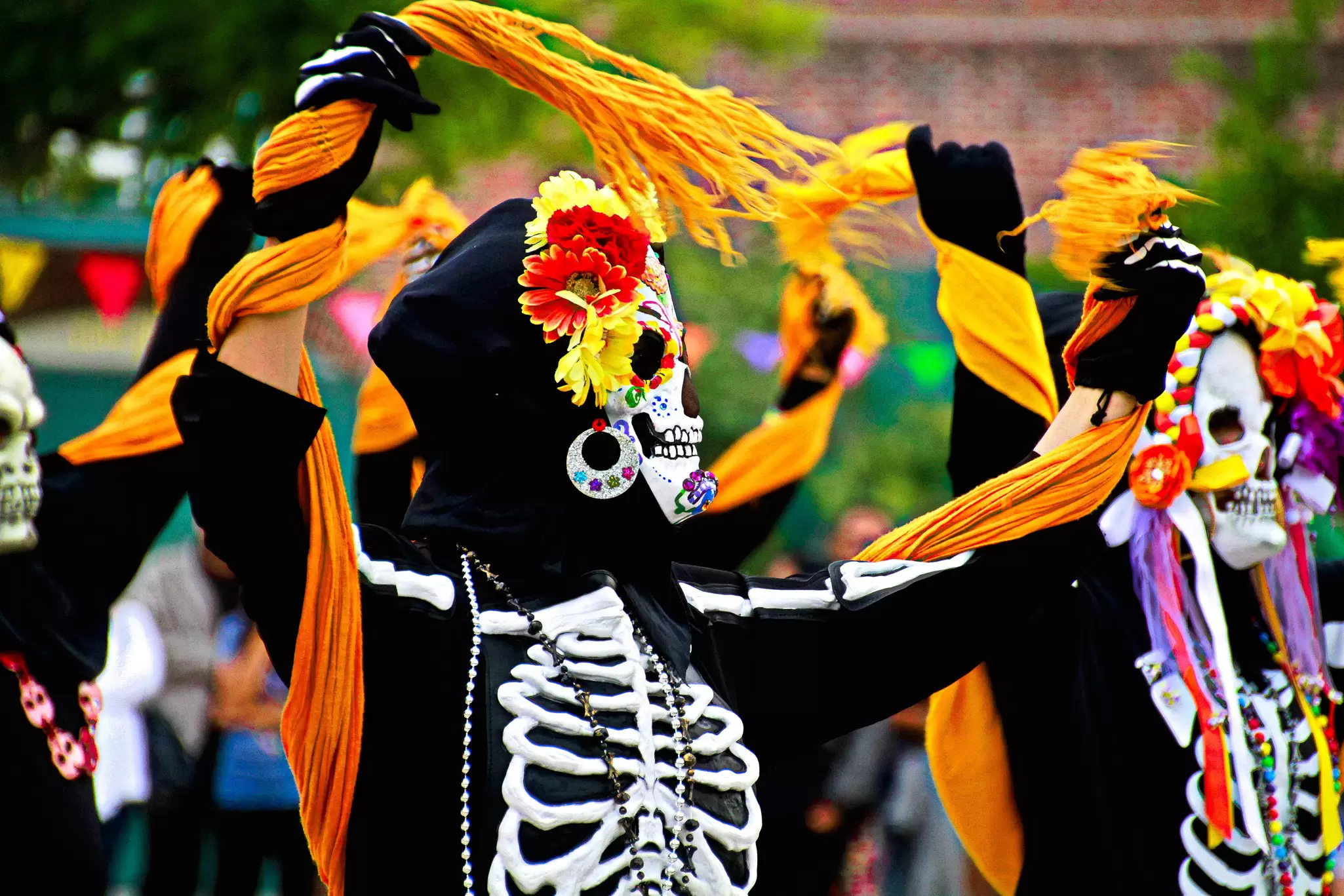 A procession of people dressed as skeletons for Día de Muertos in Los Angeles, USA.