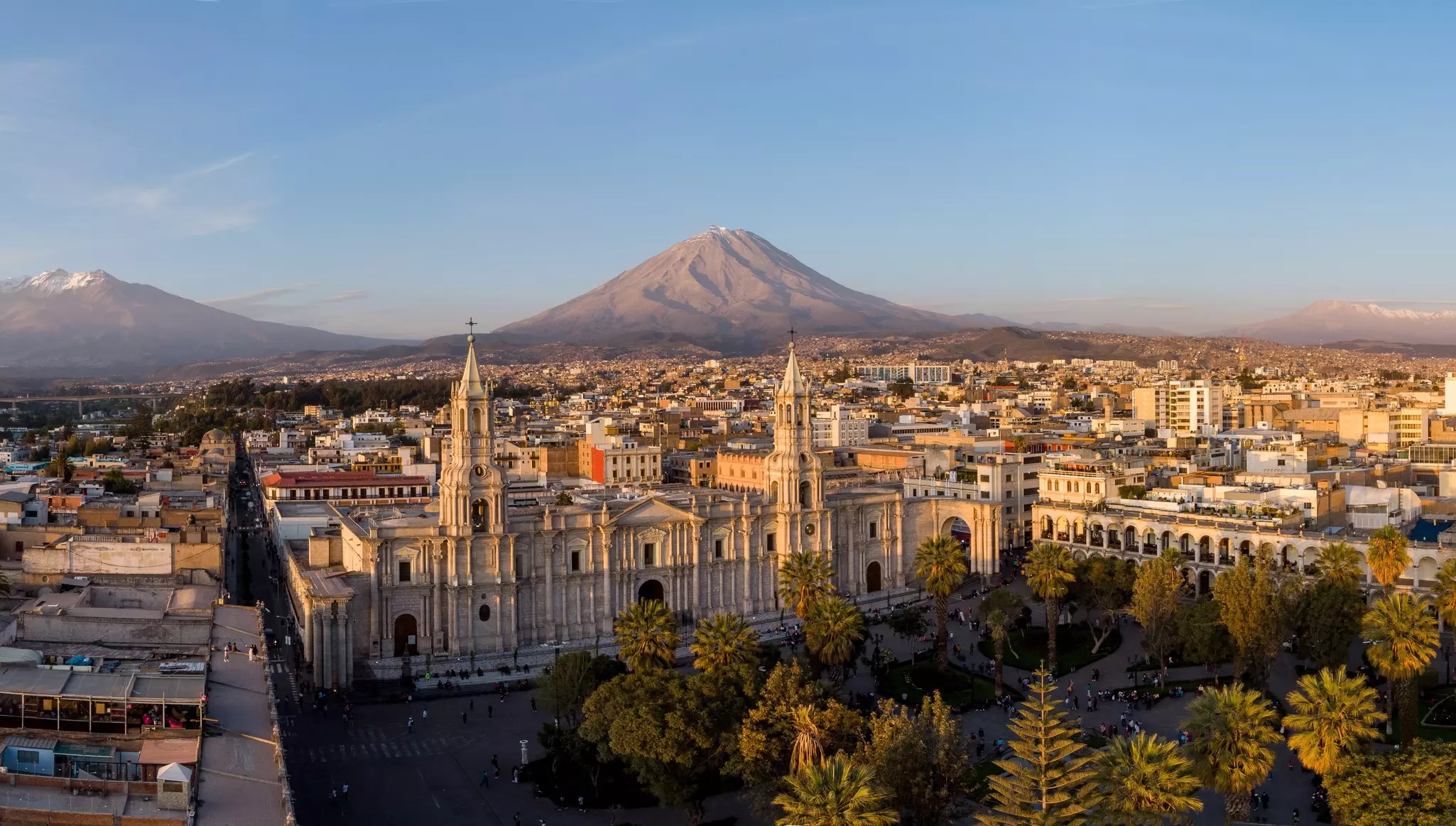 Panoramic view of the Basilica Cathedral of Arequipa and the Plaza de Armas in the colonial old town in Peru at sunset