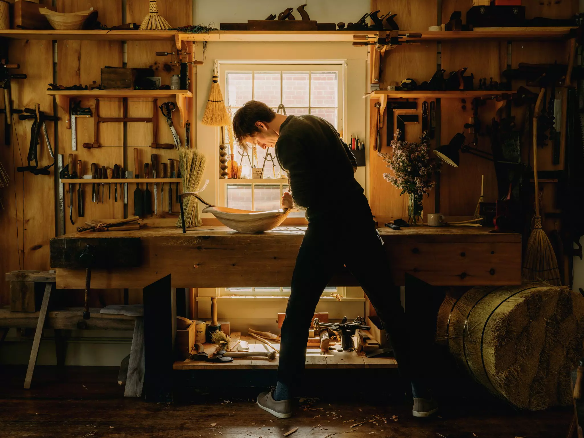 Eric, the owner of Village Handcraft, working on pieces for the store