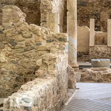Archaeological area of ​​the Roman forum of El Molinete, Cartagena, Spain with columns and cobblestone streets
