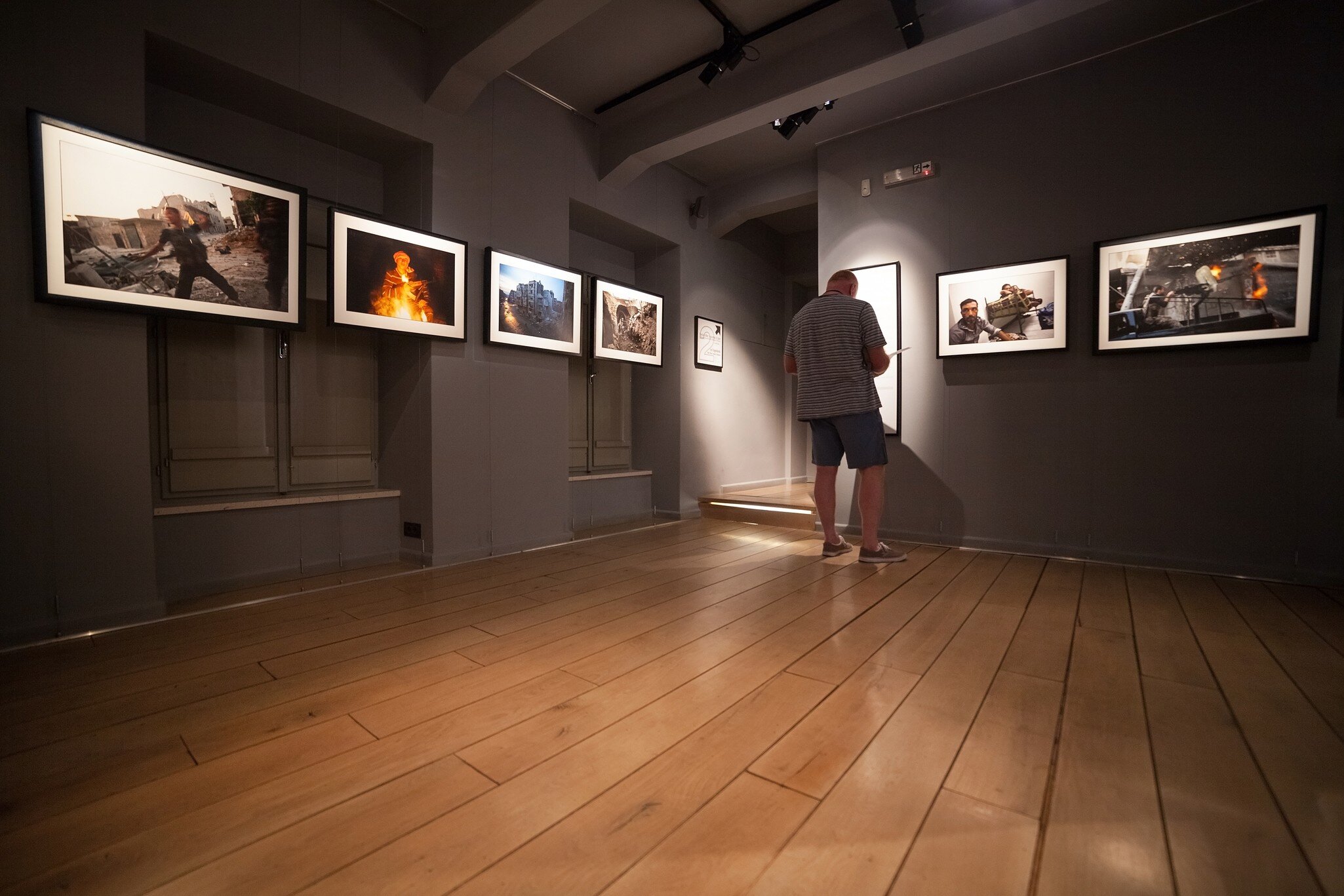 DUBROVNIK, CROATIA - MAY 26, 2014: Tourist looking at photos in the War photo limited gallery. There is 350m2 of exhibition space on two floors.
adriatic, architecture, attraction, building, city, croatia, croatian, culture, dalmatia, dark, destination, europe, european, exhibition, famous, floors, frames, gallery, heritage, historic, holiday, images, limited, looking, man, medieval, mediterranean, old, people, photo, popular, ragusa, season, shocking, site, space, summer, tourism, tourist, unesco, vacation, walls, war, world