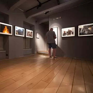 DUBROVNIK, CROATIA - MAY 26, 2014: Tourist looking at photos in the War photo limited gallery. There is 350m2 of exhibition space on two floors.
adriatic, architecture, attraction, building, city, croatia, croatian, culture, dalmatia, dark, destination, europe, european, exhibition, famous, floors, frames, gallery, heritage, historic, holiday, images, limited, looking, man, medieval, mediterranean, old, people, photo, popular, ragusa, season, shocking, site, space, summer, tourism, tourist, unesco, vacation, walls, war, world