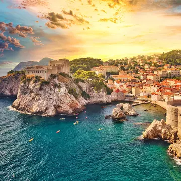 Take a kayaking tour of Dubrovnik and marvel at astonishing sunsets over these monumental fortifications that have guarded the city for more than 500 years © Benny Marty / Shutterstock