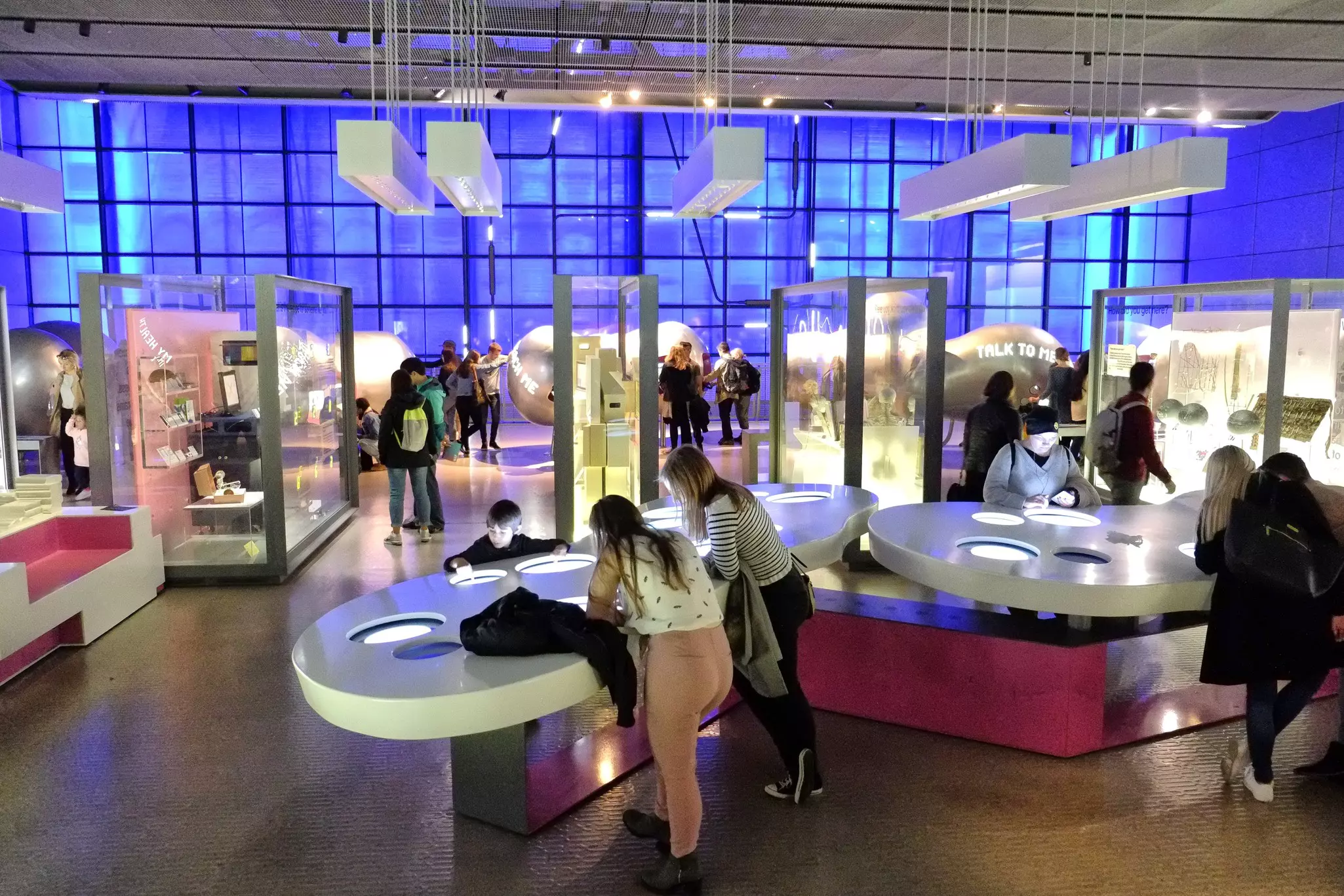 Young people investigate displays at the Science Museum in London, England.