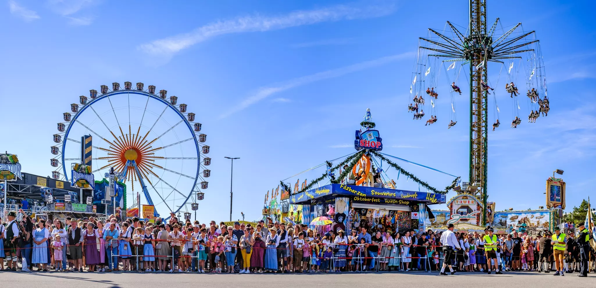 Participants with traditional clothes at a parade at the annual oktoberfest beer festival in munich.