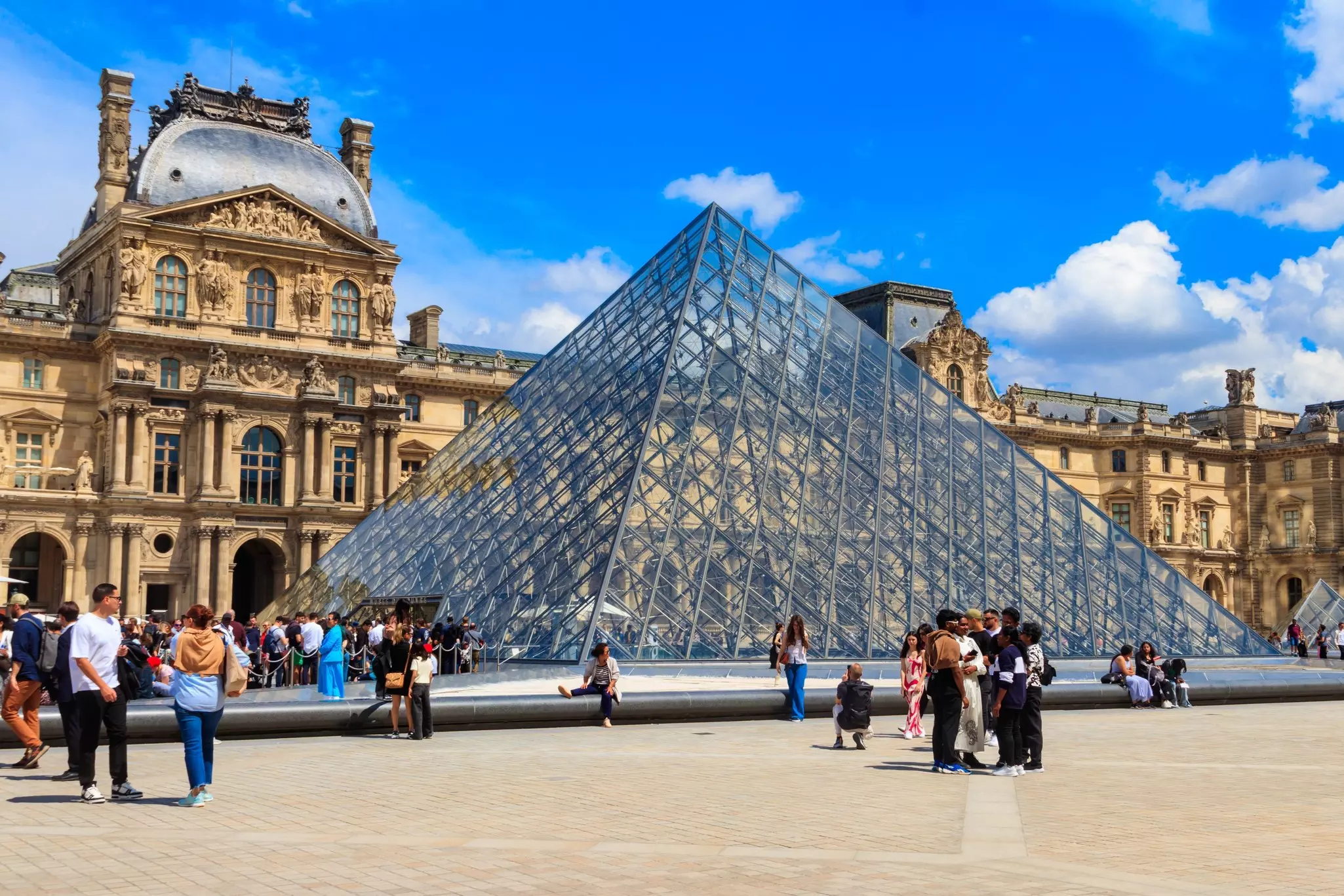 Museum of Louvre and pyramids in Paris,