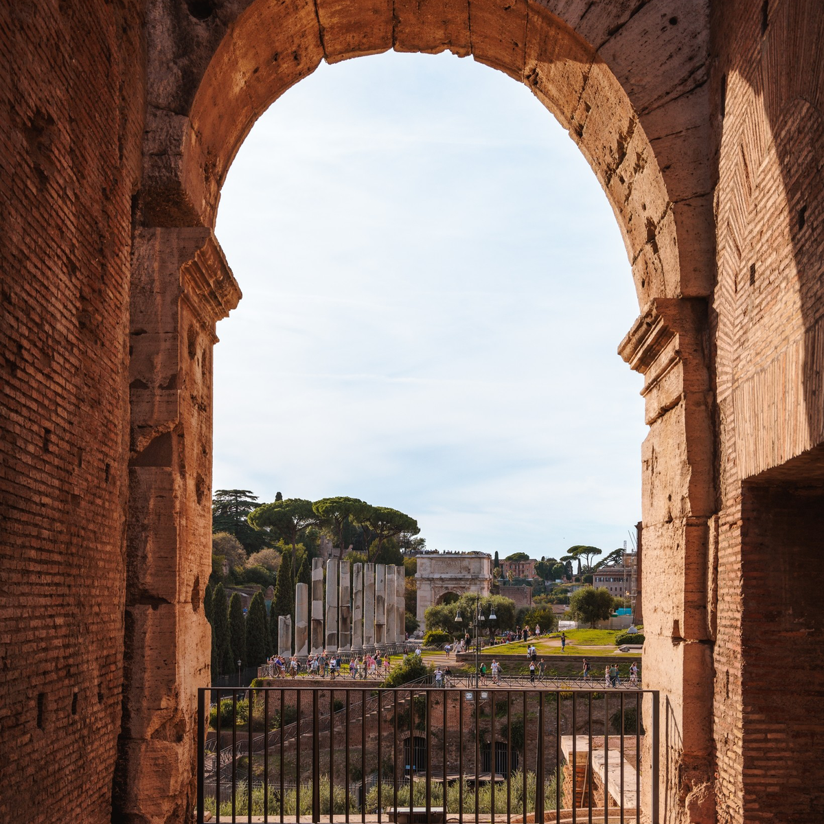 Rome viewed through one of the Roman Colosseum 80 arches