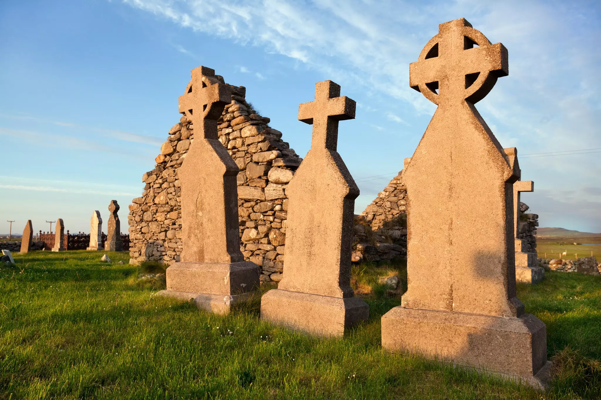A ruined chapel and graves on the island of Benbecula, Outer Hebrides, Scotland.