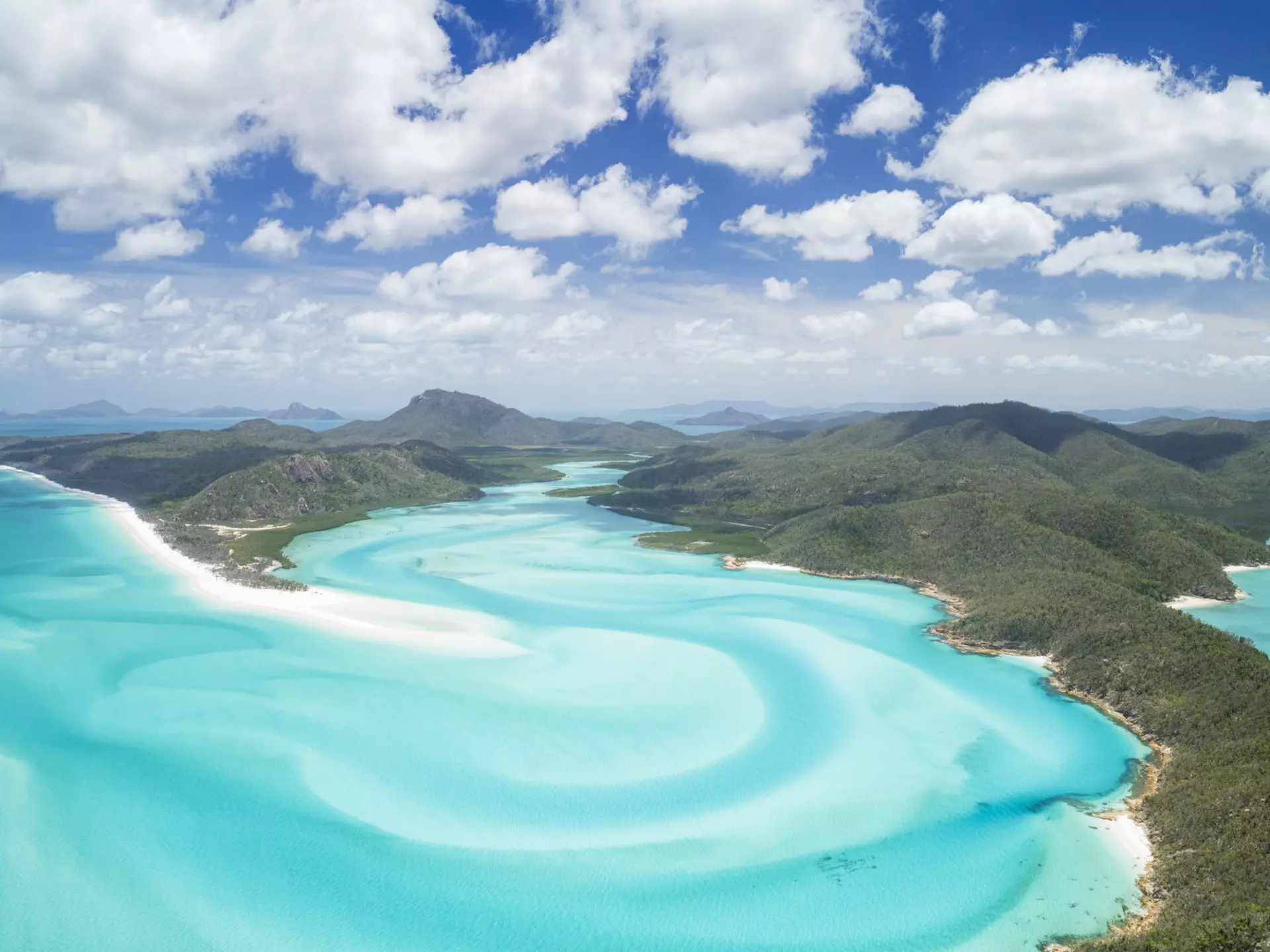 Unique aerial panorama of the famous Whitsunday Islands. 4FR / Getty Images