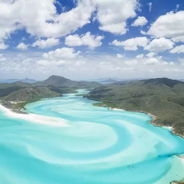 Unique aerial panorama of the famous Whitsunday Islands. 4FR / Getty Images