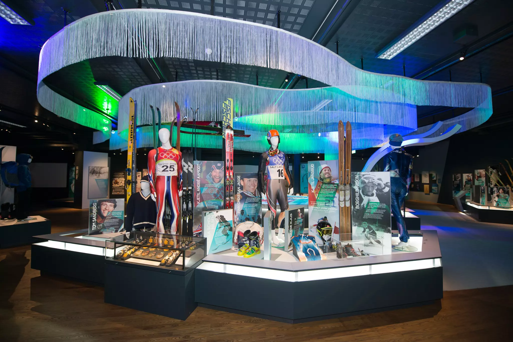 A display of athletic uniforms and equipment at a museum exhibition in Lillehammer, Norway.