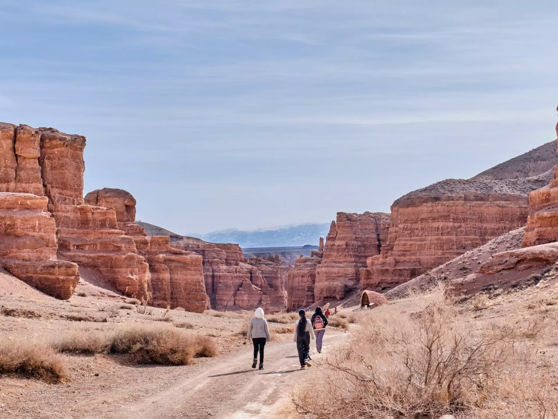Hikers in Charyn Canyon, Kazakhstan. Irina Kononova/Shutterstock