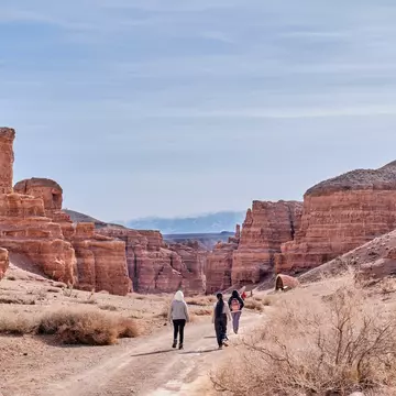 Hikers in Charyn Canyon, Kazakhstan. Irina Kononova/Shutterstock