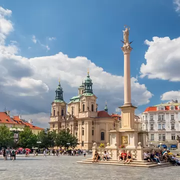Prague, Czech republic. Old Town Square with Church of St. Nicholas and Marian column.