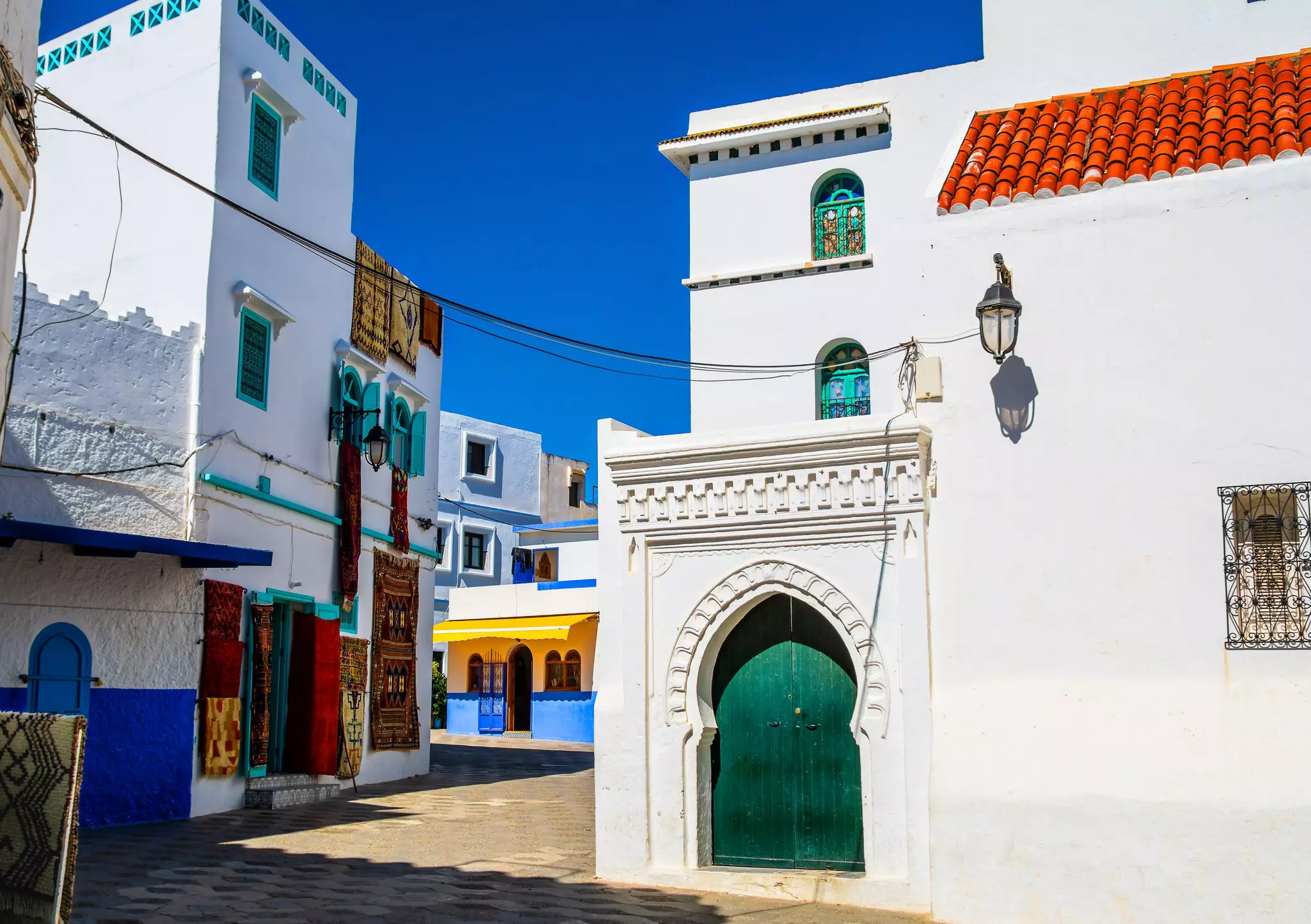 Beautiful view of street with typical arabic architecture in Asilah, Morocco