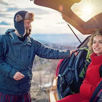 Hiking couple is resting after long trekking in mountain
932458368
activity