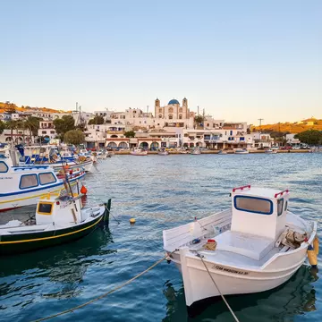 Harbour view to Lipsi with a Greek orthodox church with a blue dome in the background, hidden gem in the Aegean sea, Dodecanese, Greece.