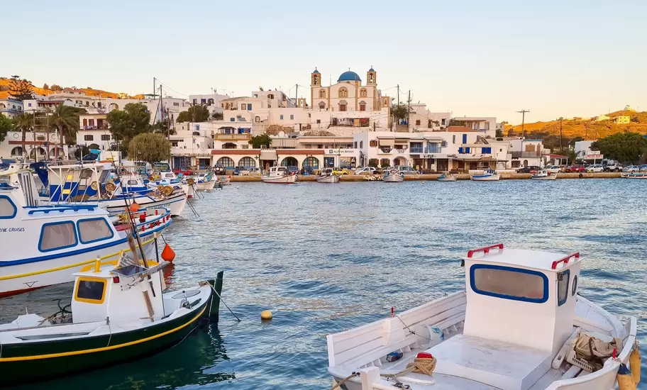 Harbour view to Lipsi with a Greek orthodox church with a blue dome in the background, hidden gem in the Aegean sea, Dodecanese, Greece.