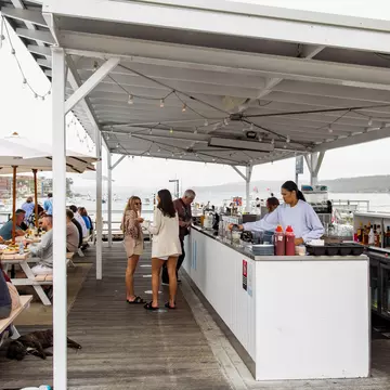 Unless you're offered table service, tipping for food or drinks is not the norm in hospitality venues. Isabella Moore for Lonely Planet