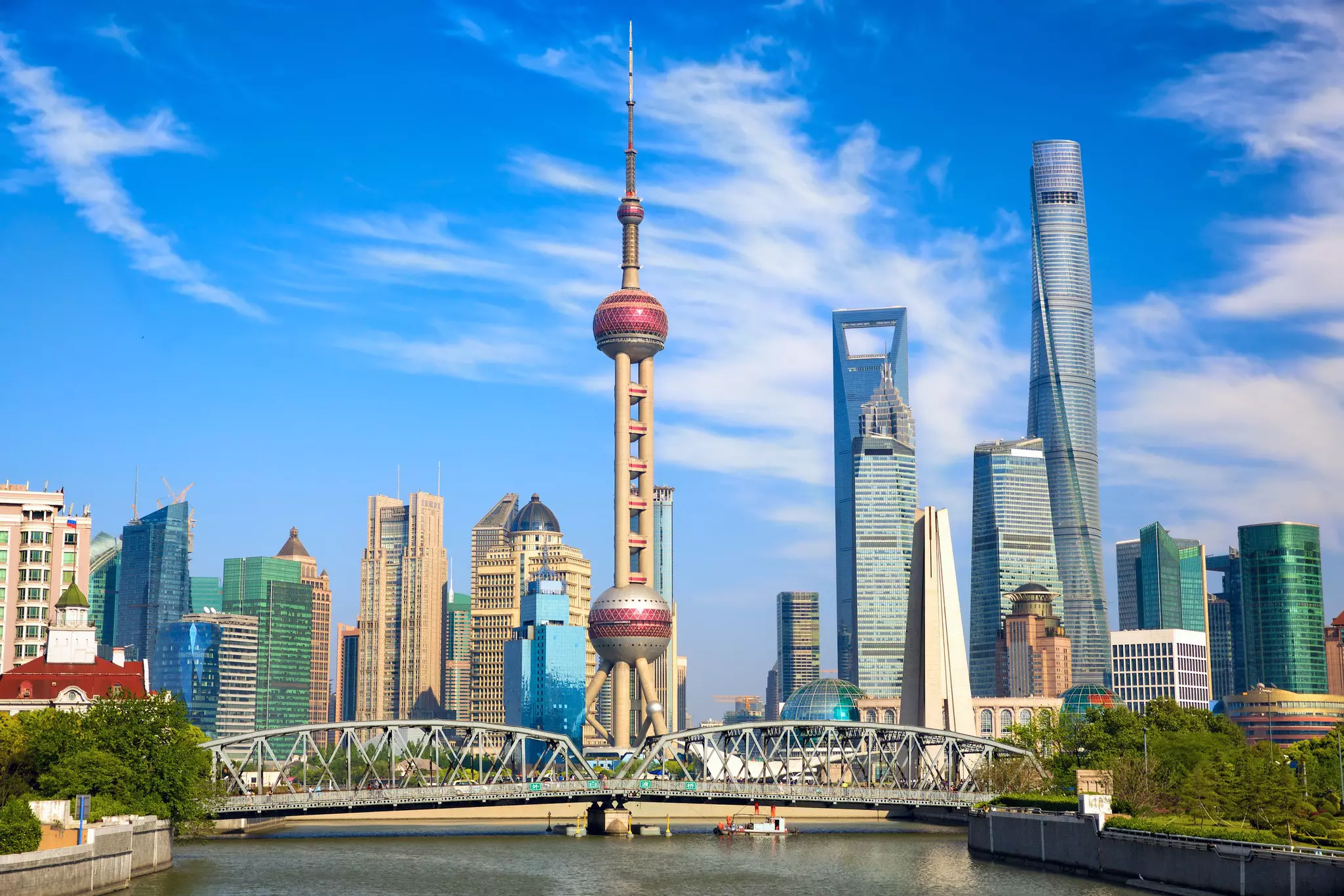 A view of the skyline of Pudong in Shanghai, China, with tall skyscrapers.