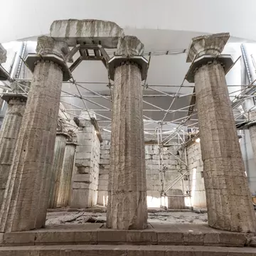 Bassae, Greece. Large ruined columns of the Temple of Apollo Epicurius inside a tent