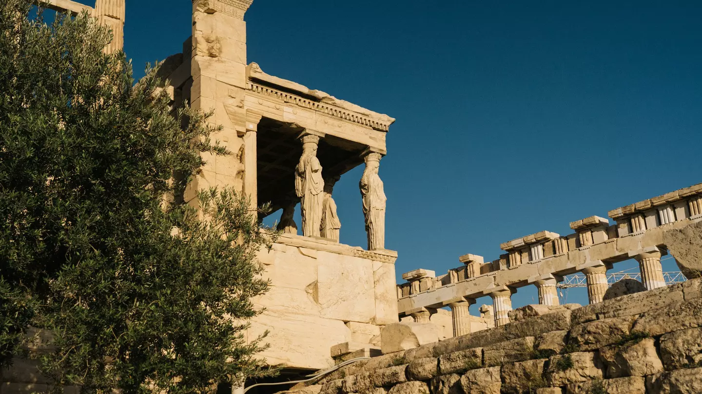 An overcast blue sky above the Shrine of the Muses, Athens
