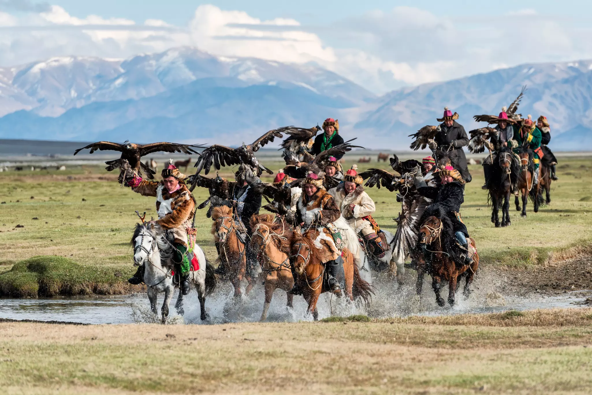 Meeting Kazakh eagle hunters is one of the dramatic experiences waiting in the Altai Mountains © Natthawat / Getty Images