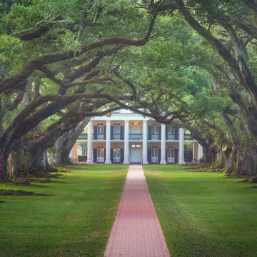 A weekend in New Orleans can be lively romp on Bourbon Street or low-key strolls through the city's historic districts. Chris Moore / Getty Images