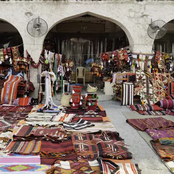 Textile shop along the street in the Souq Waqif area in Doha, Qatar