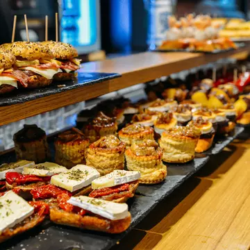 In Spain’s Basque Country, bar counters positively team with pintxos, bite-sized snacks to be enjoyed with drinks © iStock / Getty Images Plus