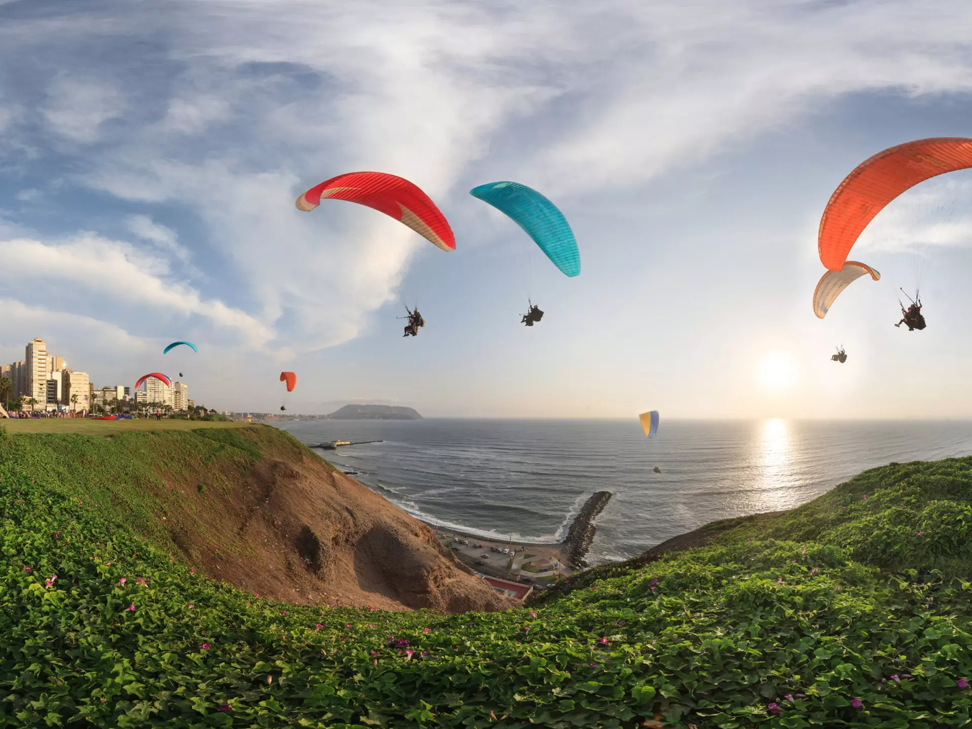 Paragliding above the malécon, Lima, Peru. Christian Vinces/Shutterstock