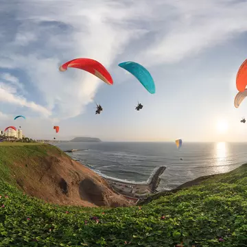 Paragliding above the malécon, Lima, Peru. Christian Vinces/Shutterstock