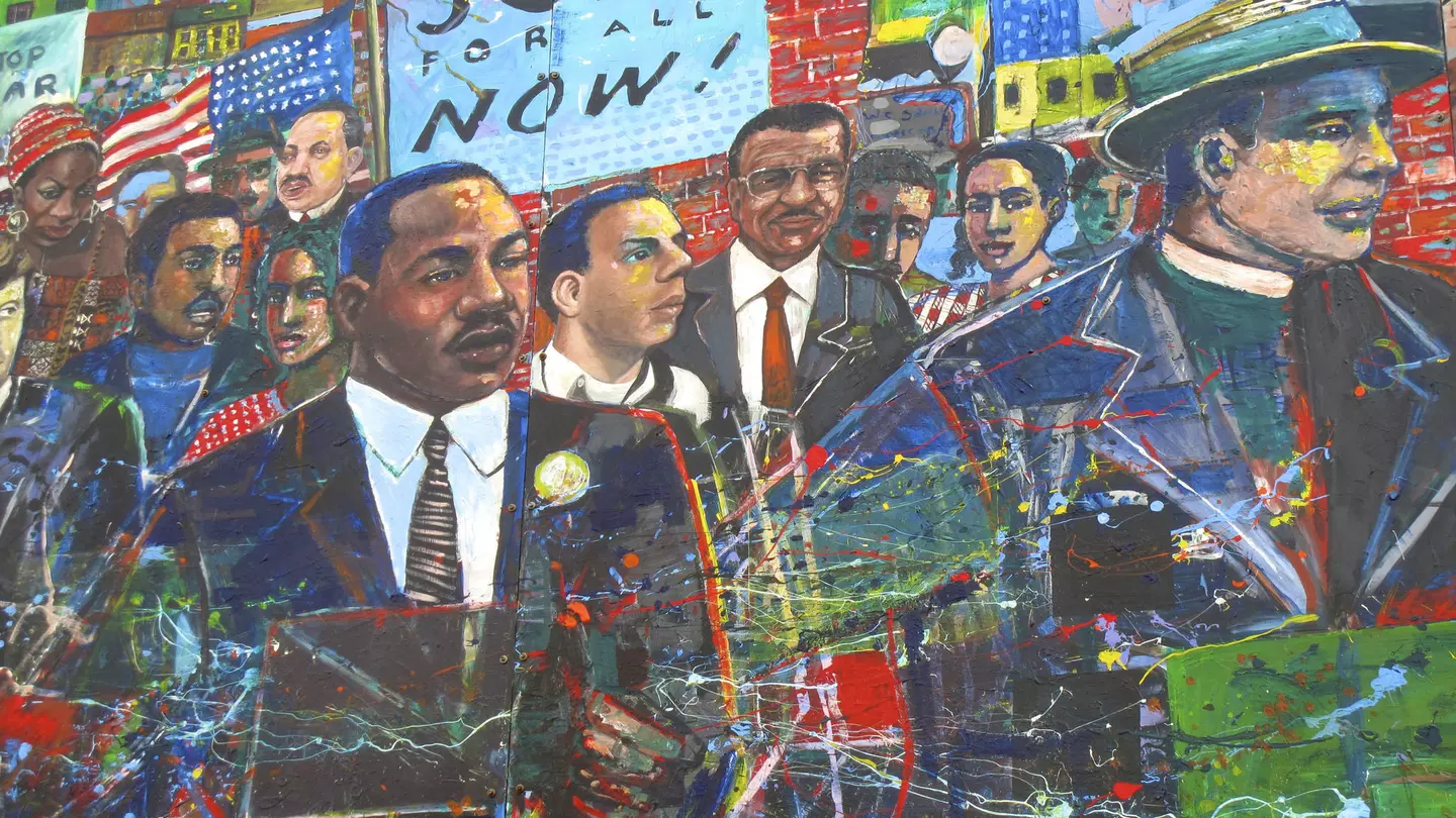 A painted mural depicts Martin Luther King Jr and other figures.