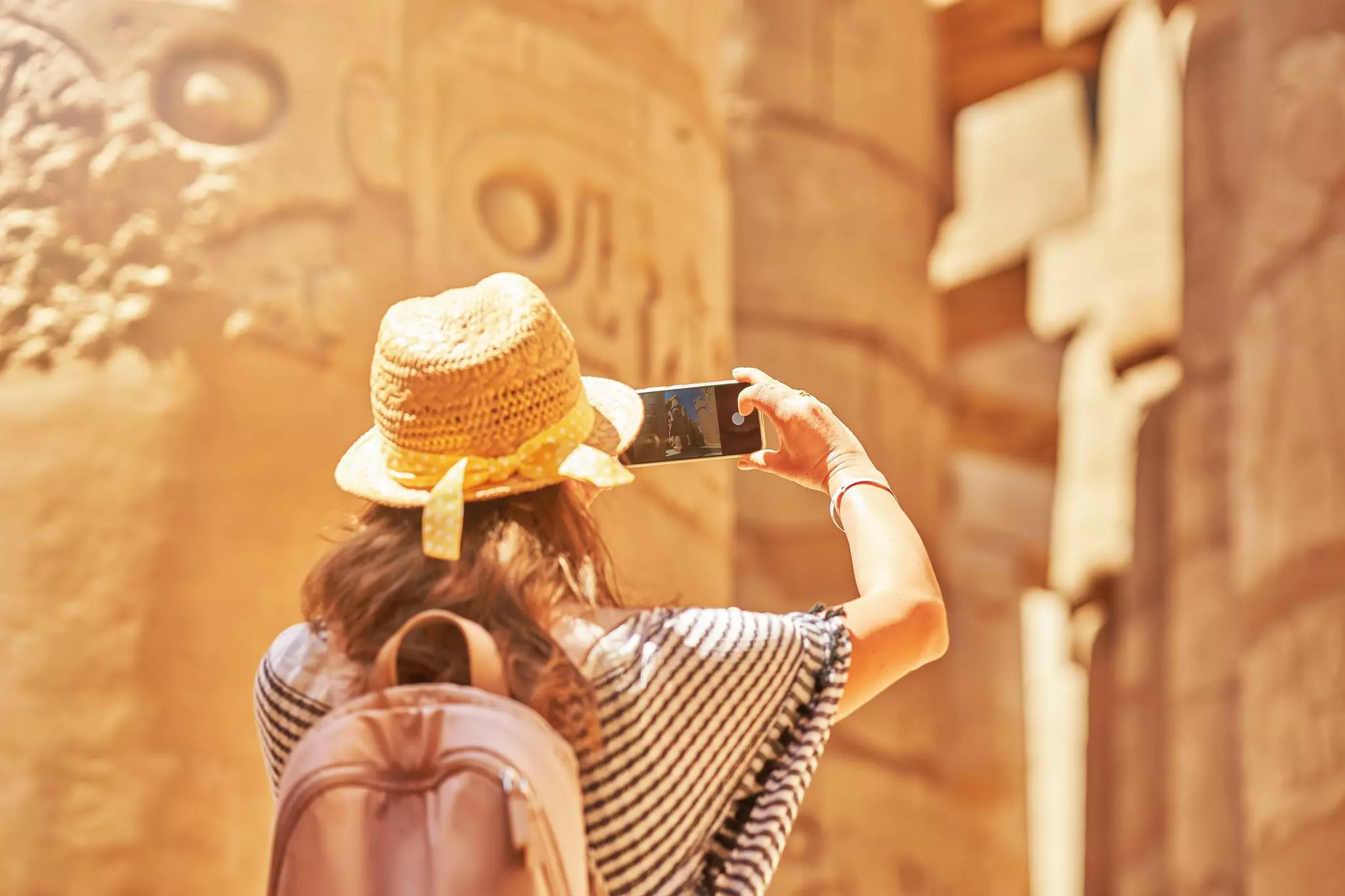 Tourist woman in Karnak Temple in Luxor Egypt