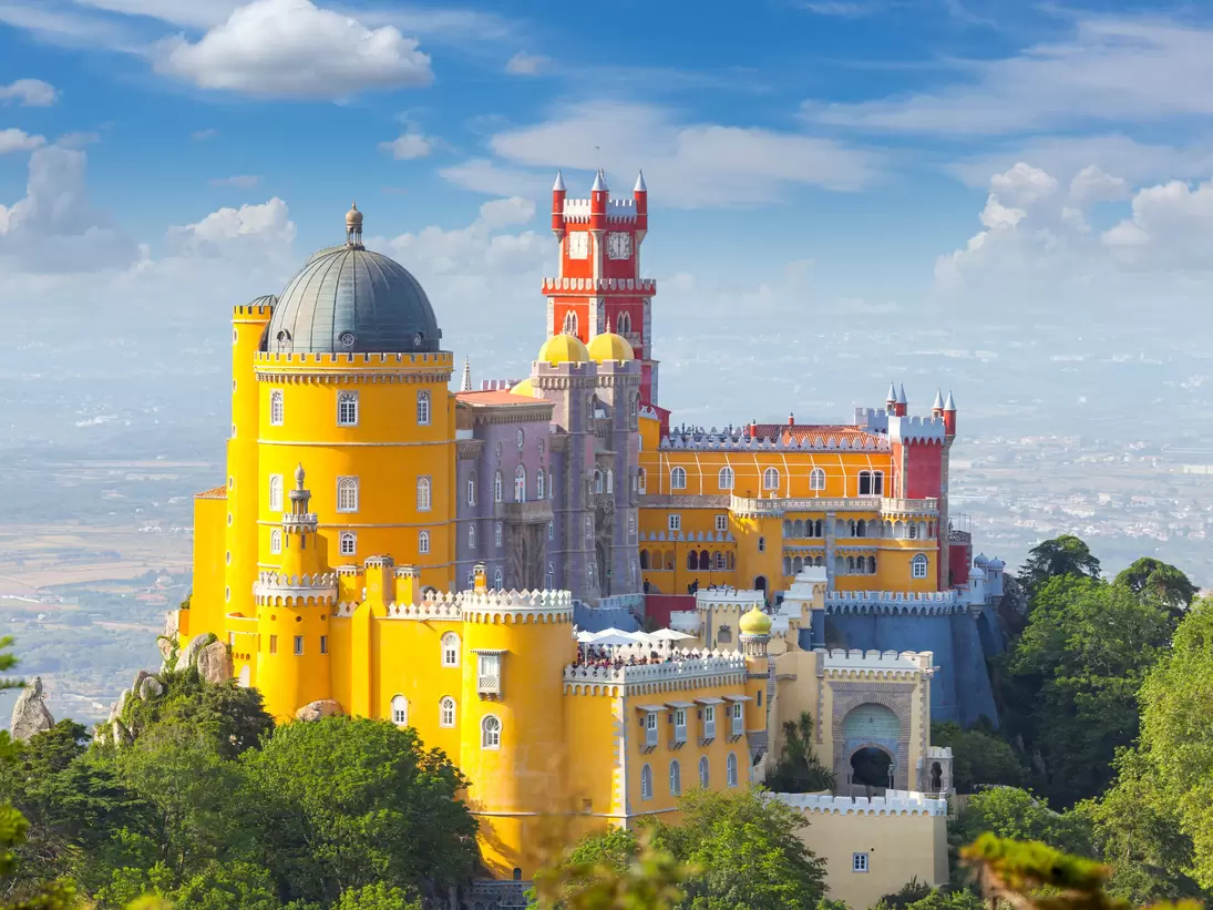 View over the Palácio Nacional da Pena on a sunny day in Sintra, Portugal.