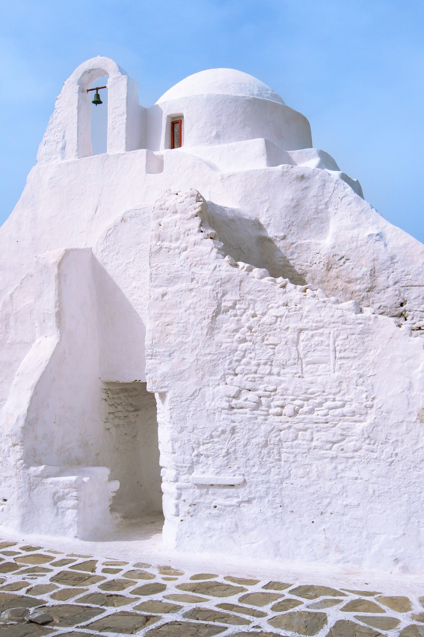 View of Panagia Paraportiani, Mykonos' landmark whitewashed church, in Greece.