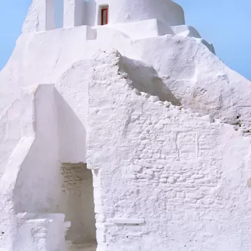 View of Panagia Paraportiani, Mykonos' landmark whitewashed church, in Greece.
