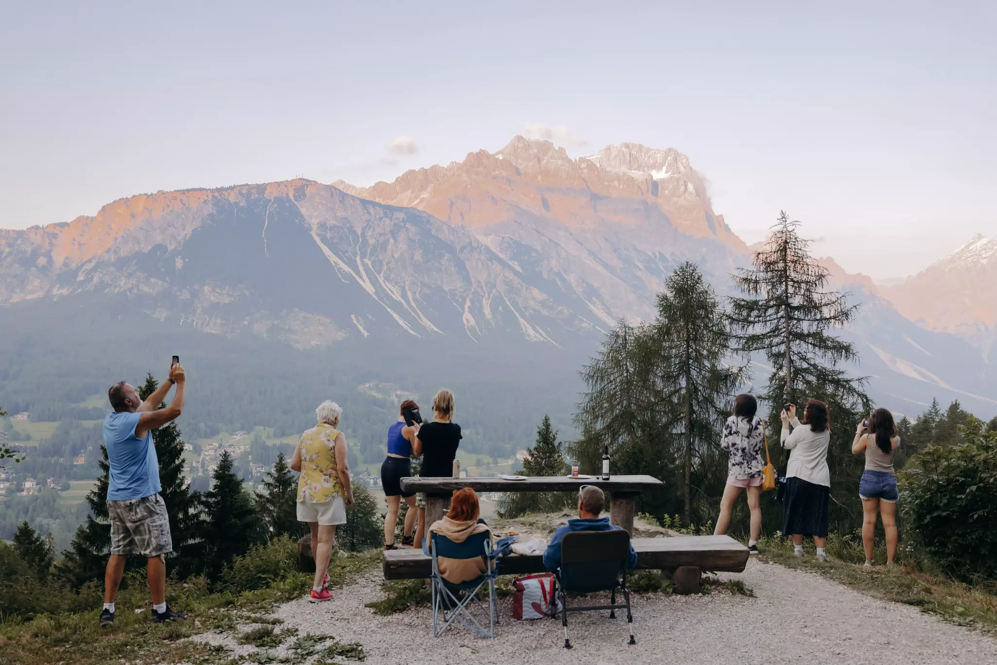 Tourists enjoy the mountain views in Cortina d'Ampezzo, Italy. Camilla Ferrari for Lonely Planet